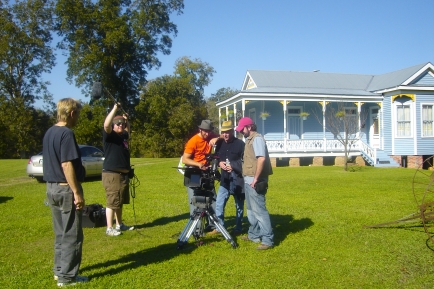 GMcGee Prod Still Crew In Front Of Blue House