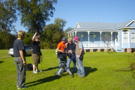 GMcGee Prod Still Crew In Front Of Blue House